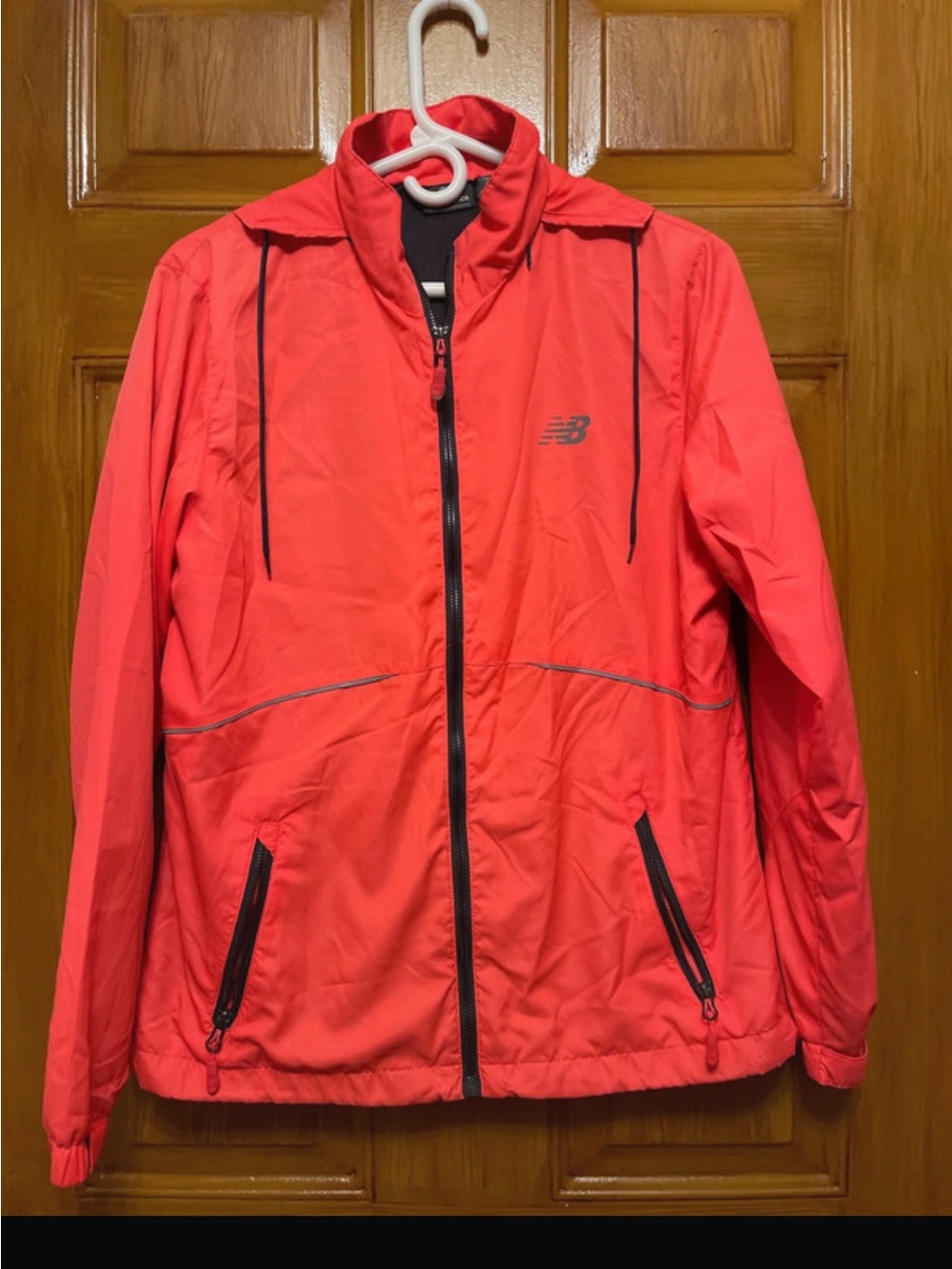 New Balance women’s Coral-Red Lightweight Jacket